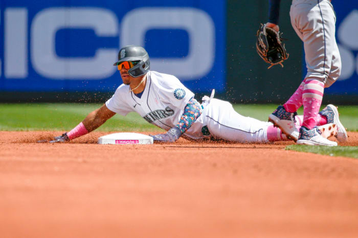 Mariners center fielder Julio Rodriguez steals second base against the Rays during the first inning at T-Mobile Park.